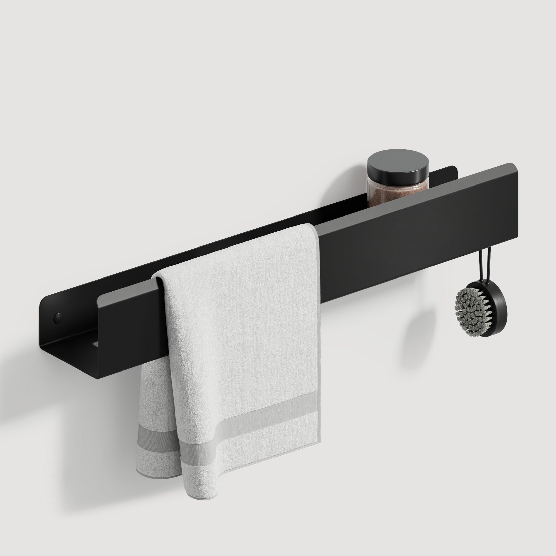 metal shelf with towel and hook