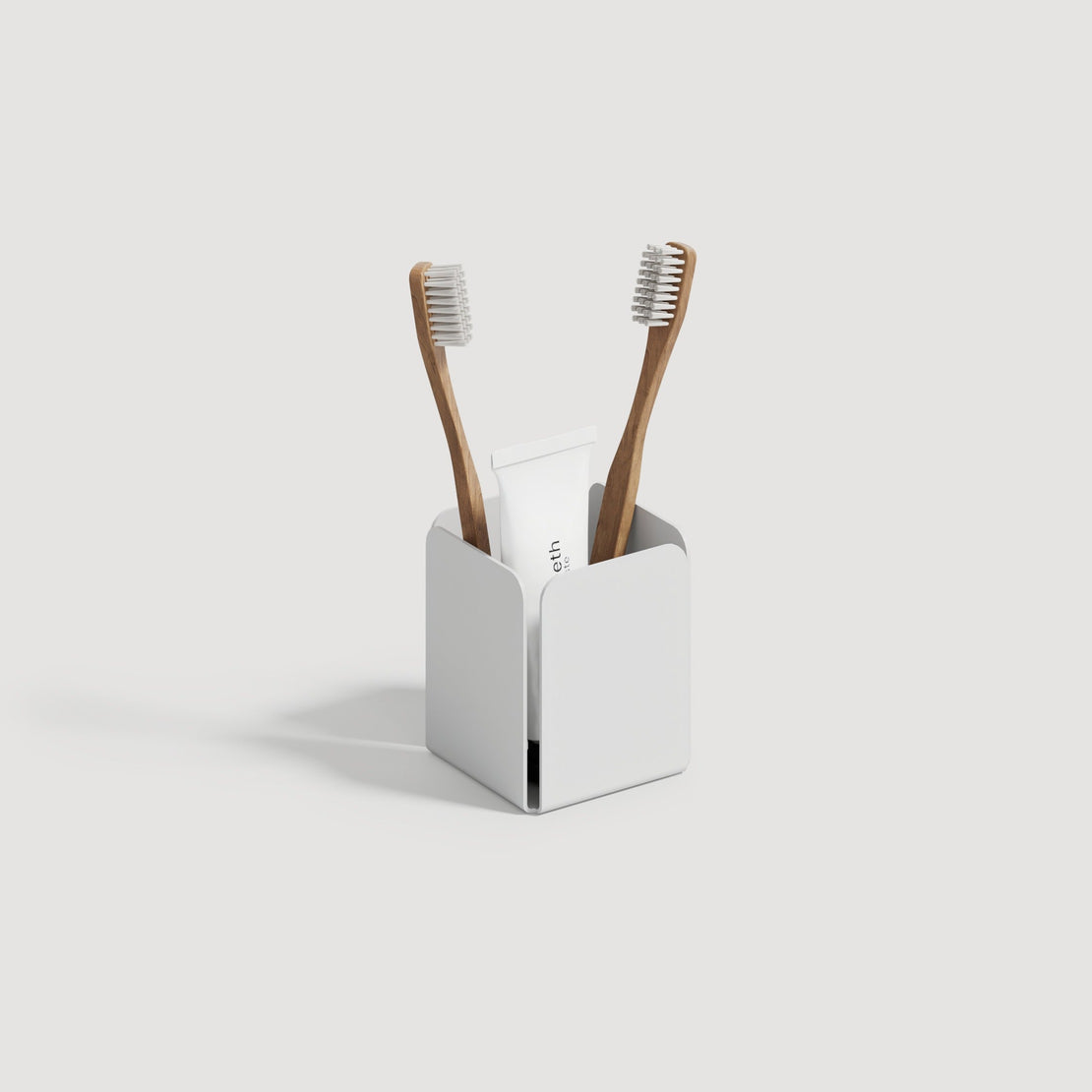 white metal toothpaste holder style