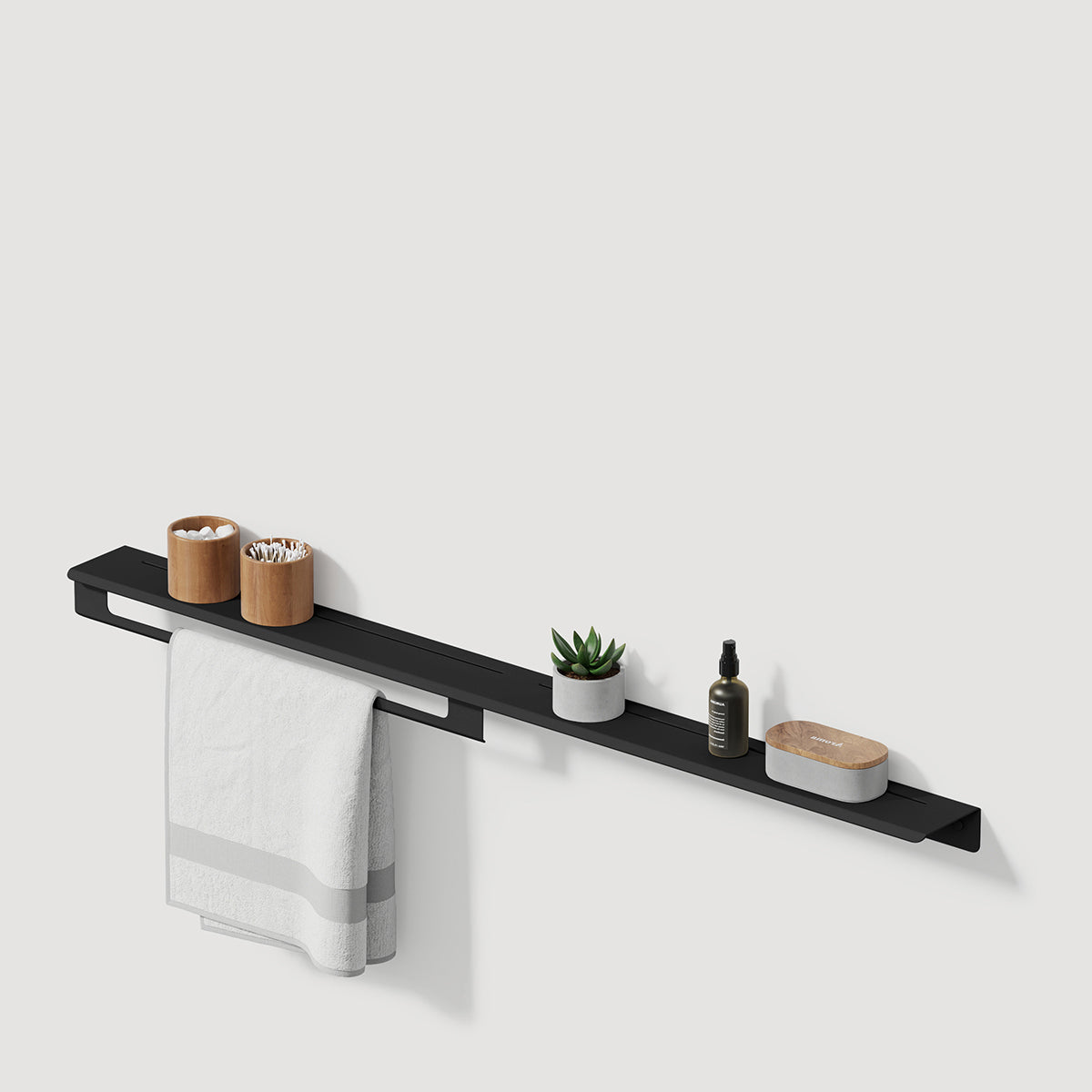 long metal shelf with towel holder on left