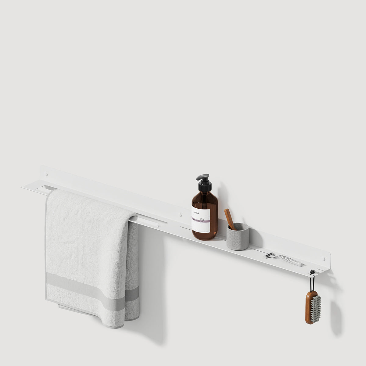 white metal bathroom shelf with towel rack